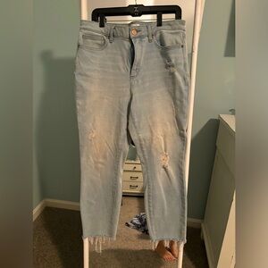 Slightly distressed jeans. Lauren Conrad. Size 14. With stretch and raw hem.